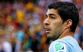 Luis Suárez bites the hand that feeds after scoring two goals for Uruguay  in 2014 World Cup defeat of England