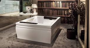 Haiti, vasca angolare idromassaggio treesse gruppo rubinetto e pannello. Treesse Rem