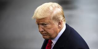 Federal judge sanctions Trump and his lawyer nearly $1 million