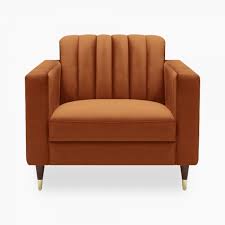 The soft velvet upholstery covers the entire seat, back and curved arms of the chair. Burnt Orange Velvet Upholstered Belgravia Armchair Modern Sofas