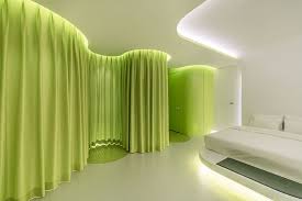 Sml S Lime Green Suite Resembles A Futuristic Spaceship Cabin Suite Green Architecture Home Decor