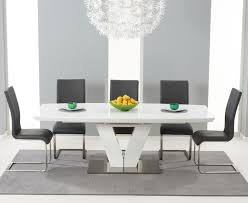 The dining table white chairs are made from strong materials that are highly durable to give you long lifespans. Malaga 180cm White High Gloss Extending Dining Table With Malaga Chairs