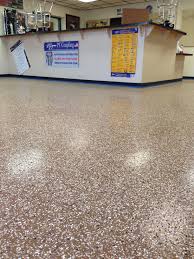 Commercial Floor Retail 1 4 Saddle Tan Flake Blend Medium Broadcast On Baja Beige Colored Epoxy Vapor B Commercial Flooring Epoxy Floor Flooring Inspiration