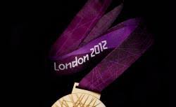 In contrast to his other olympics appearances, london 2012 did not start off with a medal for phelps. Olympic Medal Ribbons Here S Everything You Need To Know About The Purple Ribbons Hanging Around Olympic Champions Necks