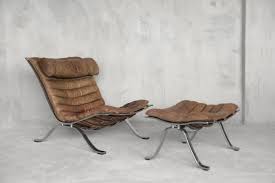 The reclining chair and matching stationary ottoman are upholstered in bonded leather for top quality and lasting comfort. Mid Century Swedish Cognac Leather Ari Lounge Chair And Ottoman Set By Arne Norell For Norell Ab 1960s For Sale At Pamono