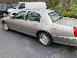 Image result for Charcoal Green 1999 Town Car