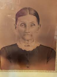 Looking for a picture. Louisa (Rose) Newman. Across the top my "Family  Photos" wall I have a picture of every generation