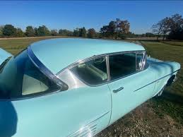 Image result for Turquoise 1958 Cadillac