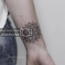 12 Stunning Mandala Tattoos With Deep Meanings Rihanna Hand Tattoo Mandala Tattoo Tattoos