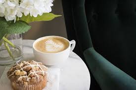 Latte Art With Muffin And Emerald Green Arm Chair Return Of The Ikea Strandmon Cozy Coffee Shop Seating Area Cozy Coffee Shop Coffee Shop Green Armchair