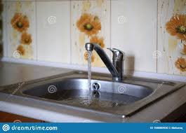 stainless steel sink plug hole close up