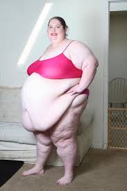 Detine titlul de „cea mai grasa femeie de pe planeta si mai vrea inca un titlu: Foto Cea Mai Grasa Mama Din Lume Obligata De Logodnic Sa Manance Antena 1