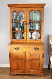 Unknowns that can be solved with a little sandpaper and primer! Painted Hutch Makeover Abby Lawson