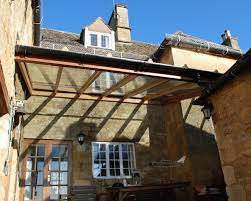 Glass enclosed patios provide a great solution to this problem while also giving you the sleek and stylish look that you'll want. Porches Canopies Evesham Glass