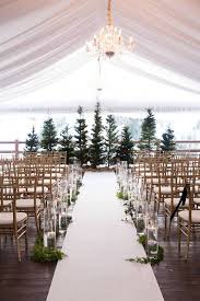 17 Winter Wedding Ideas We Love Domino Evergreen Wedding Wedding Ceremony Decorations Outdoor Outdoor Wedding Ceremony