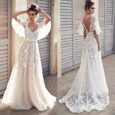 Gorgeous Tulle A Line Backless Boho Floral Appliques Beach Wedding Dresses Sw296 In 2020 Short Sleeve Prom Dresses Prom Dresses Lace Best Wedding Dresses
