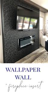 our black wallpaper wall with a fireplace insert jennifer allwood home wallpaper fireplace fireplace accent walls fireplace inserts