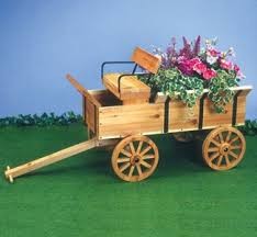Pin By Linda Schlunsen On Small Back Yard Wagon Planter Easy Woodworking Projects Woodworking Plans