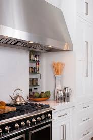 Installing the spice racks above the stove. Hidden Spice Rack Design Ideas