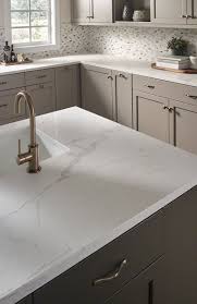 Moonshine Cabinets And Carrara Marmi Quartz For The Laundry Room Kitchen Remodel Countertops Quartz Kitchen Countertops Kitchen Countertops