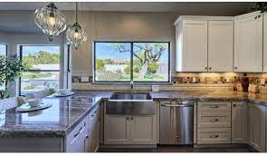 The overall classic look of the design is achieved with light quartz countertops and backsplashes. Cabinet Diy Medium