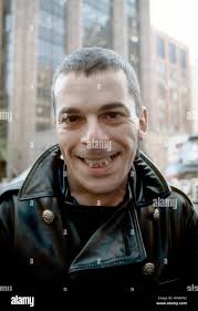 Ian Dury shows off the Union Jack