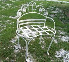 Old used chopper bicycle parts, metal pipes. Wrought Iron Small Kidney Bench W Flowers Solid Metal Furniture Very Nice Metal Furniture Wrought Iron Wrought