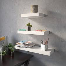 Shop for white floating shelves at crate and barrel. Wall Decor Wall Shelf Set Of 3 Floating Shelves Organizer White