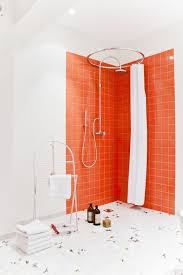 Shower Space With Bright Orange Tiles And White Grout Orange Tiles Shower Tile Orange Bathrooms Designs