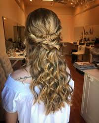 Fishtail side braids with loose bun. 18 Stunning Curly Prom Hairstyles For 2020 Updos Down Do S Braids