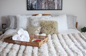 Picture frame mouldings create a feature wall and the satin black bed frame adds a modern traditional edge. An Affordable Online Interior Design Bedroom Project For House Of Hipster Decorist