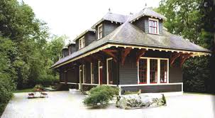 A Real Train Station Turned Into A House Love The Dark Grey Green Siding With Almond Trim And Barn Red Windows The Home Of Weekend House House Exterior House