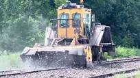 Tamper and Ballast regulator in action on Watco track in Carona Kansas July  1, 2023 Harsco 6700