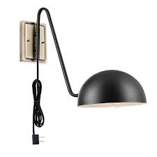 Black accents with an aged brass finish work together in perfect harmony. Globe Electric Addison 1 Light Plug In Wall Sconce In Matte Black And Antique Brass Bed Bath Beyond
