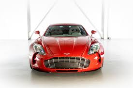 Image result for Magma Red 2011 Aston Martin