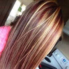 The dye in blonde haircolor is almost always cool (blue). Red And Blonde Highlights Hair Styles Hair Highlights And Lowlights Blonde Highlights