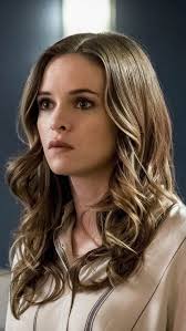 Caitlin's grey sweater with rose print sleeves