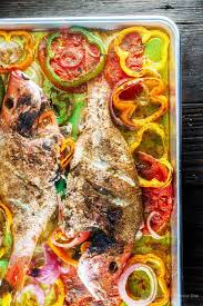 Mediterranean Whole Roasted Red Snapper With Garlic And Bell Peppers The Mediterranean Dish Snapper Recipes Baked Snapper Recipes Red Snapper Recipes Baked
