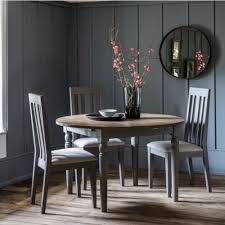 This dining set includes four fantastic slatted dining chairs made of beech. Gallery Direct Cookham Round Extending Dining Table Grey Oak Leader Furniture
