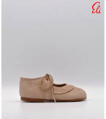 Merceditas niña Eli ante taupe