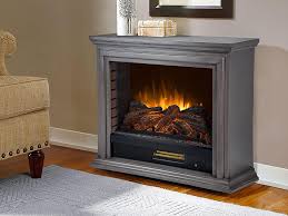 With its 5,200 btu infrared heater, the electric fireplace can warm even the largest rooms. Sheridan Infrared Electric Fireplace Heater In Dark Weathered Grey Electric Fireplaces Direct