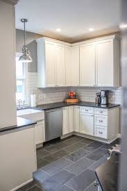 Diy Flooring Projects Gray Tile Floors Cheap Floor Ideas For Those On A Budget Inexp Kitchen Cabinet Design Kitchen Floor Tile Farmhouse Kitchen Cabinets