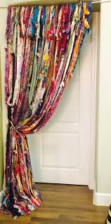 By pushing the bed to the far wall, the designers were able to open the floor plan and make room for a super cute and comfortable swinging chair, a hallmark piece for bohemian. Speak Out Board Game Family Ridiculous Mouthpiece Challenge Fun Hasbro Chop Boho Curtains Hippy Room Boho Room