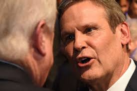 Gov. Bill Lee of Tennessee speaks with a supporter