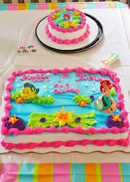 Go to like walmart and buy a cake (or cakemix). Little Mermaid Birthday Cake Walmart Ariel Cake Walmart Cakes Walmart Sheet Cake Lizz Mermaid Birthday Cakes Little Mermaid Birthday Cake Custom Birthday Cakes