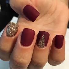 picture of matte burgundy nails with a