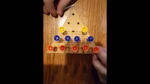 This is a simple little puzzle that's easy to make, and is a great display piece.a golf ball is sealed inside a jar full of water, and you simply have to balance the ball on a tee that's glued to the lid. Fastest Peg Game Solution Cracker Barrel Game Youtube