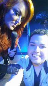 Vicki thanks Megan for help at Wynonna Judd concert