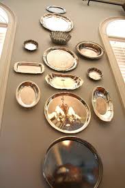 How To Hang Silver Plate Trays On A Wall Ehow Plates On Wall Silver Platters Silver Display