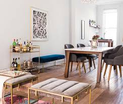 Lignia wood is used on the bay window, front porch and stairs, and rear deck. Eclectic Brooklyn Brownstone